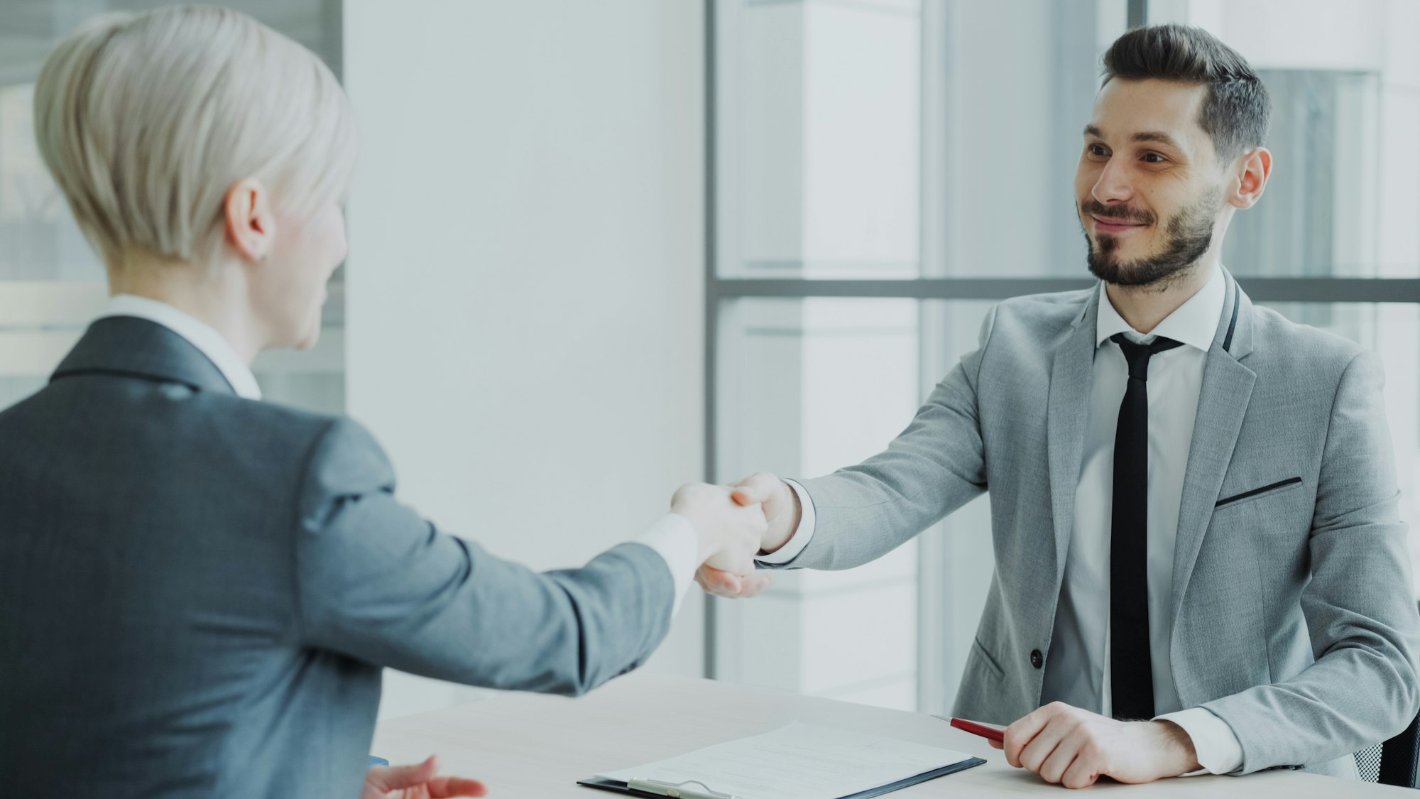 hero-handshake-meeting